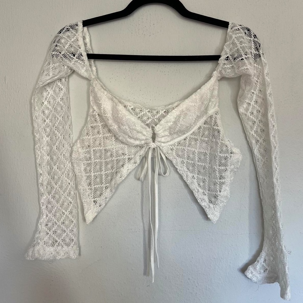 White lace crop top with a tie in the front